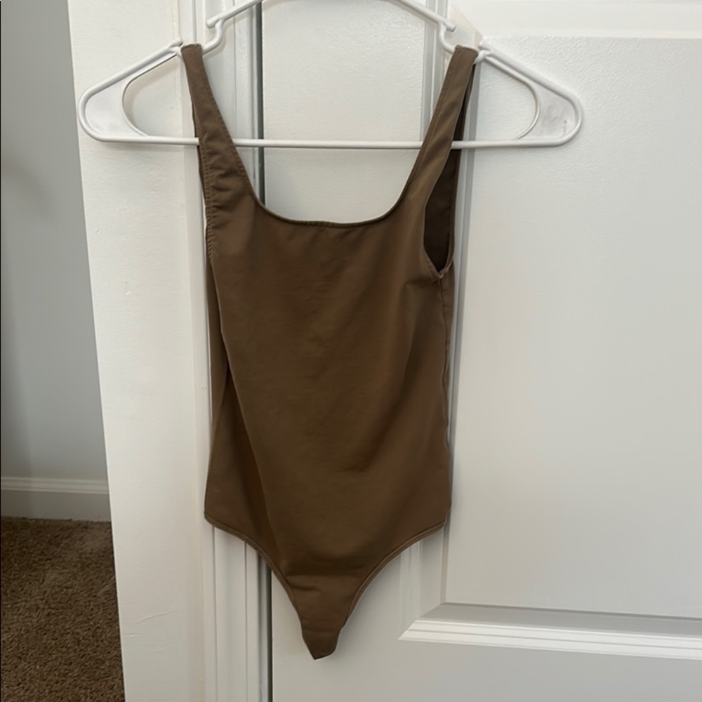 skims xs bodysuit brown/Army Thong style no snaps. Worn twice